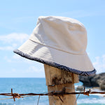 Load image into Gallery viewer, REVERSIBLE BUCKET HAT WITH UPCYCLED BLACK YAKAN
