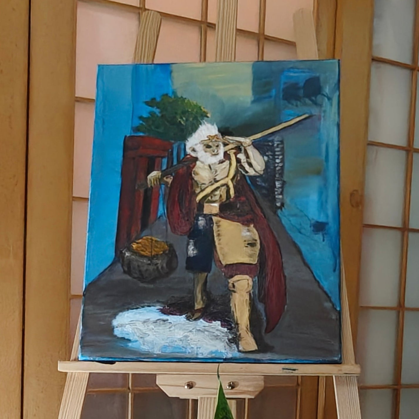 Painting of a character on an easel with a wooden background