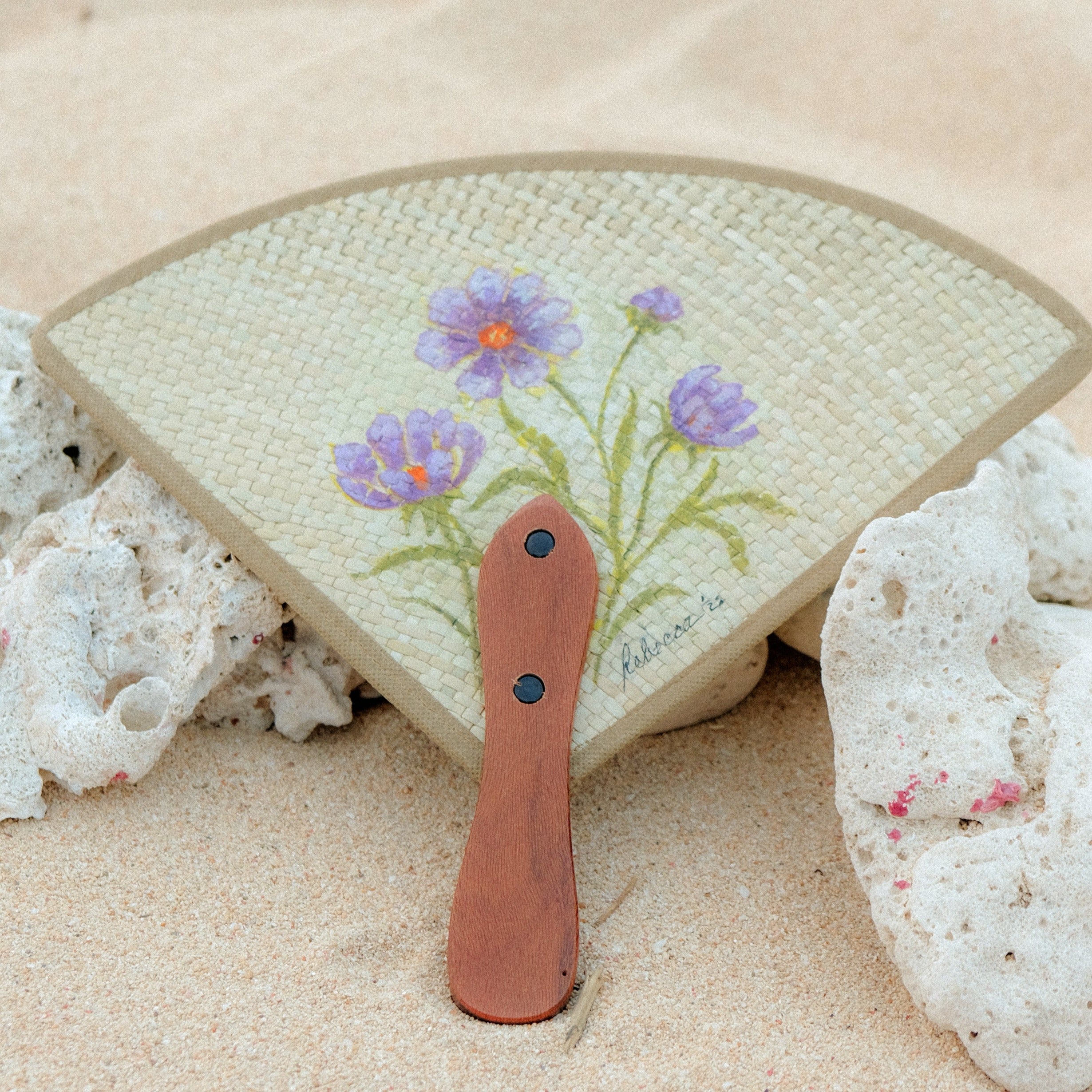 hand-painted traingular fan made with natural fibers from the Philippines