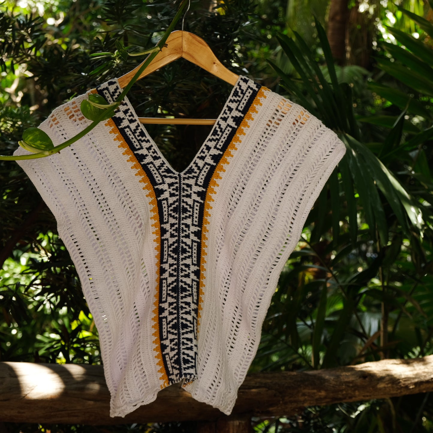 ORLA MOSAIC CROCHET MINI PONCHO IN WHITE NAVY AND MUSTARD